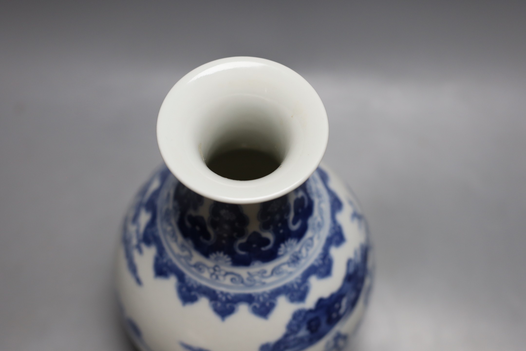 A Chinese blue and white baluster vase, Qianlong mark but later 22cm